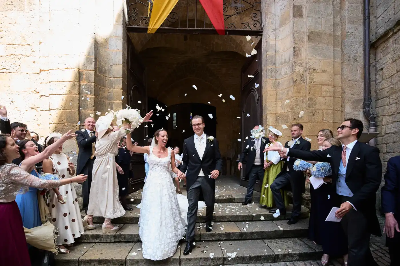 Ceremony exit at Sarlat cathedral, Dordogne wedding