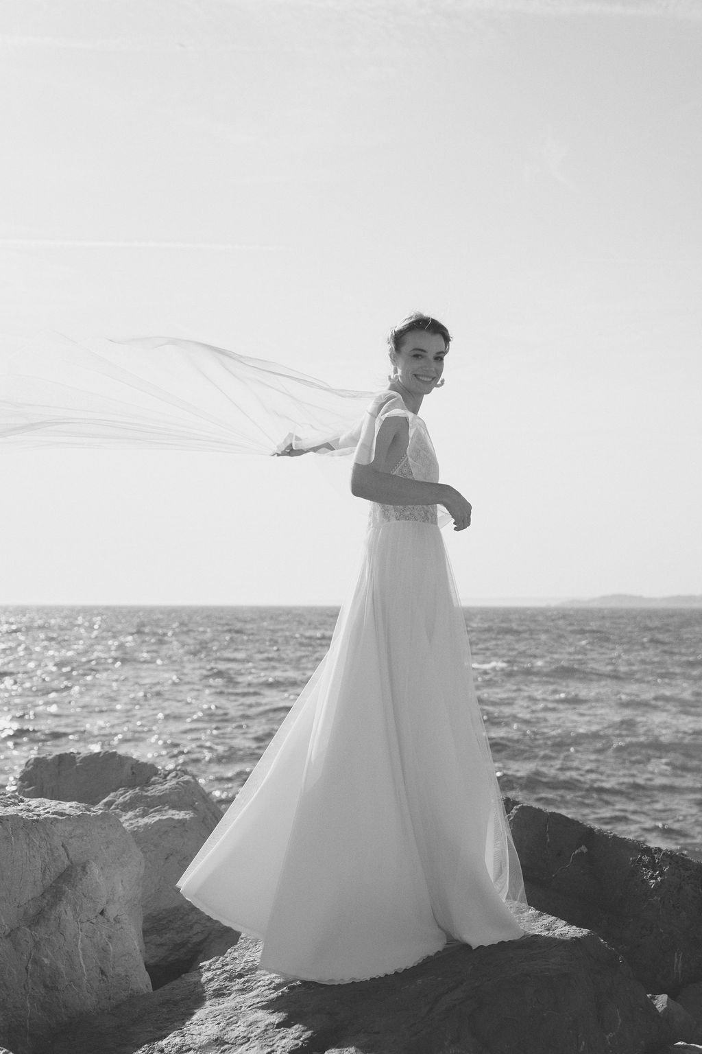 Wedding dress inspiration Provence — Lambert Création flowing tulle gown by the sea