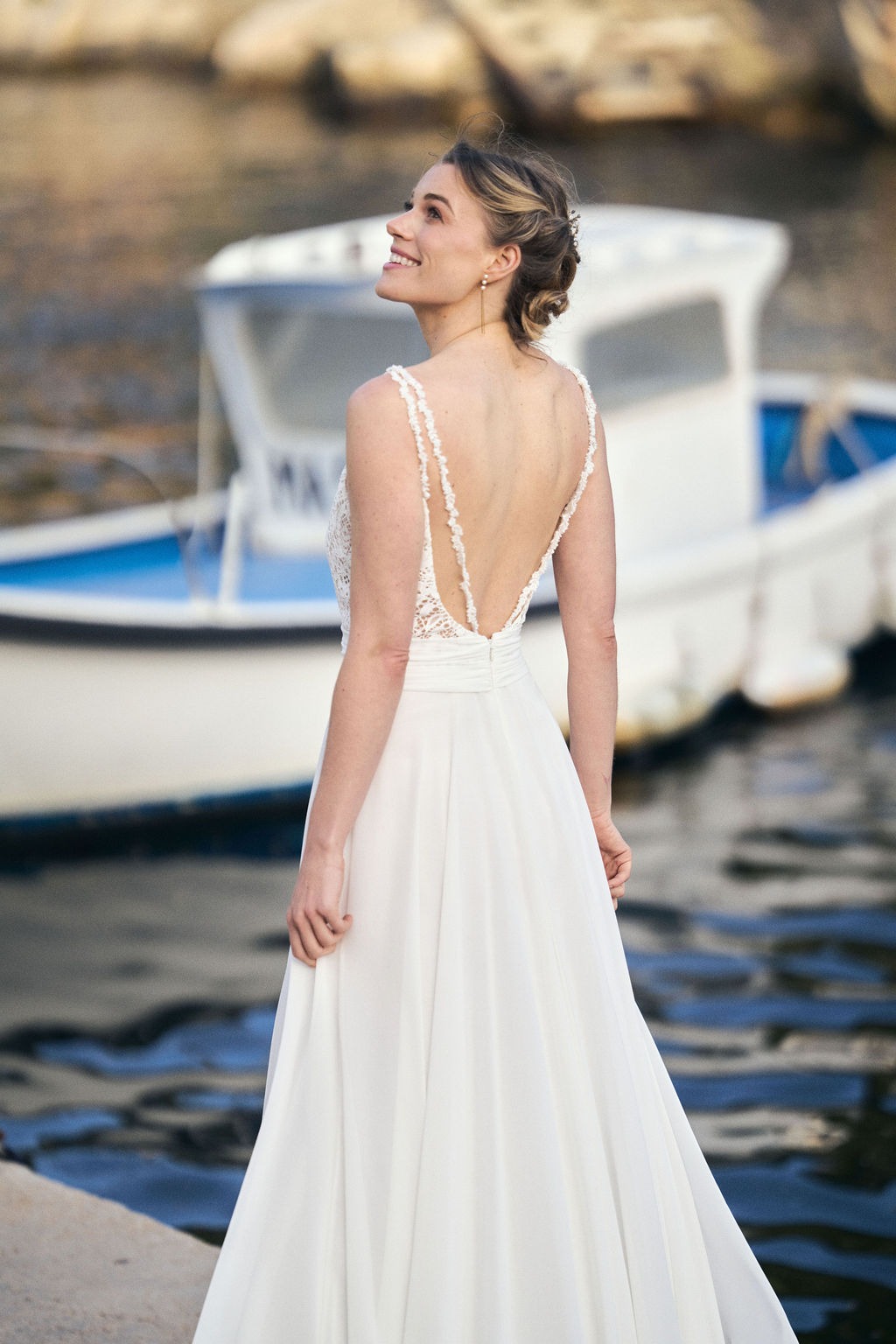 Barefoot bride in a Mediterranean fishing village — editorial wedding photography France